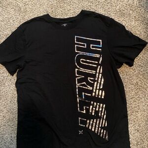 Hurley Black Short-Sleeve Tee with Iridescent Vertical Logo. Men’s Large. NWOT